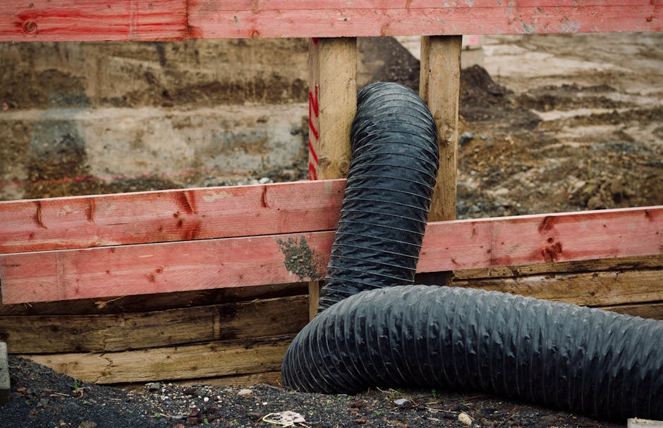 Aging flexible air duct runs in a hot residential attic